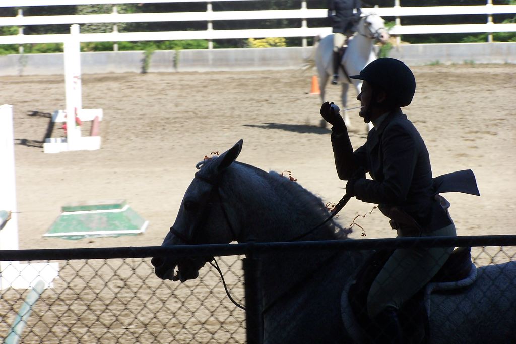 Egg on spoon going in mouth at canter.