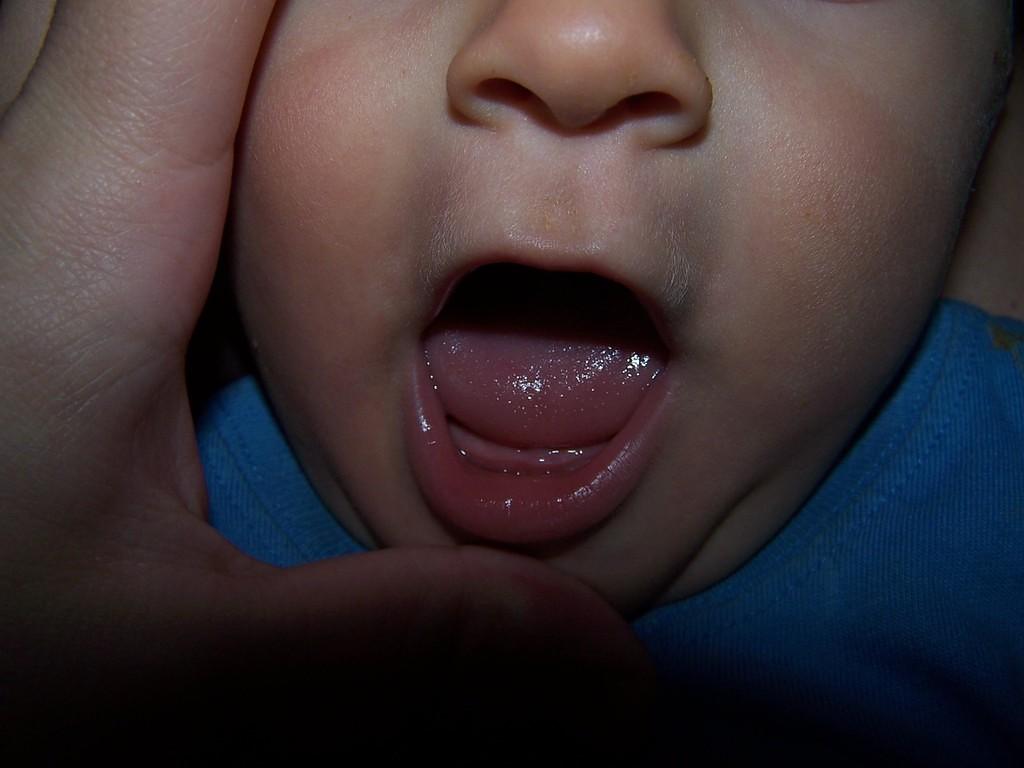 See his first tooth?